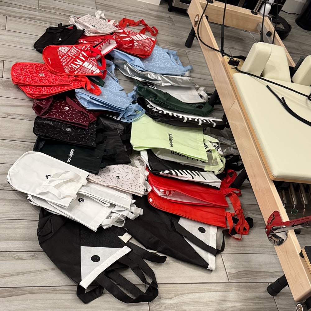 40 LULULEMON Bags in Variety of Colors & Styles 12 Large, 28 Small